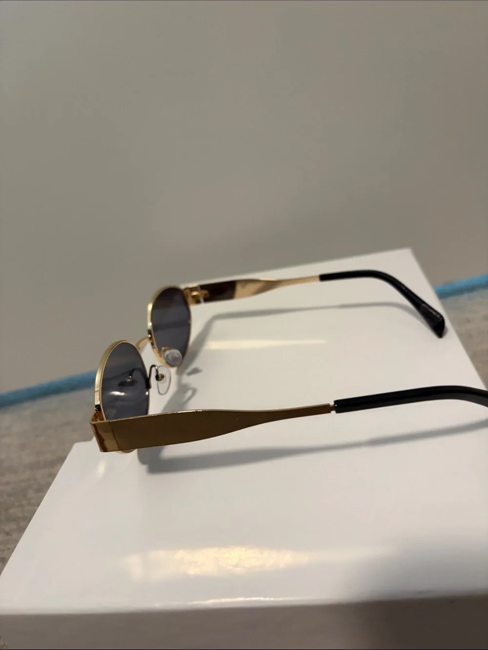Amazon Gold Frame Black Lens Oval Sunglasses for Women